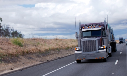 Front view of a truck driving in the truck lane