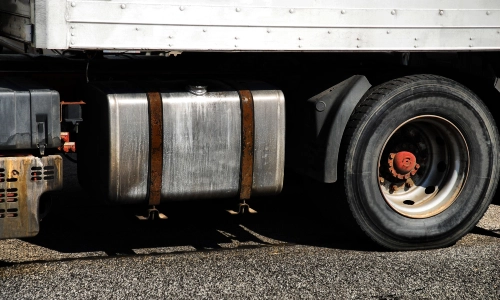 Close up of a freight truck's fuel tank